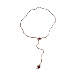 Minimalist silver snake necklace featuring elegant red pear-cut zircon gemstone pendants