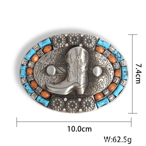 Western cowboy belt buckle with oval floral patterns and turquoise beads