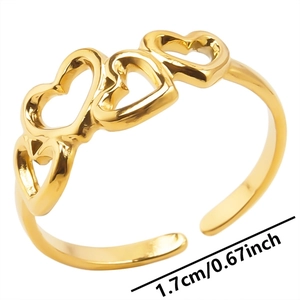 Detailed view of gold heart ring with 1.7cm diameter measurement for size reference