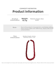 Detailed view of red glass bead necklace with 44.8cm length and copper clasp