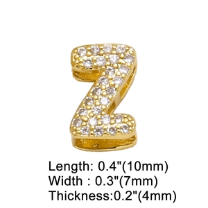 Detailed view of gold letter Z pendant with clear zircons and dimension markings
