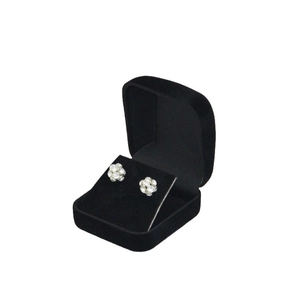 Spherical silver stud earrings with rhinestones in a black velvet gift box
