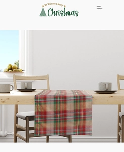 Classic red and green plaid Christmas table runner on a natural wooden dining table