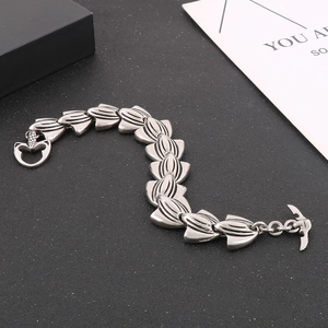Detailed view of punk style stainless steel bracelet with snake scale links and retro finish