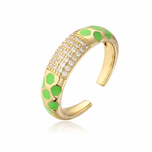 Detailed macro view of 18K gold-plated ring with green enamel and pavé zircon stones