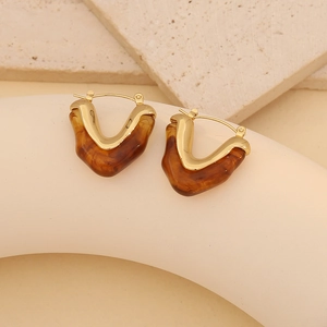Elegant geometric V-shaped earrings with amber resin and gold stainless steel finish