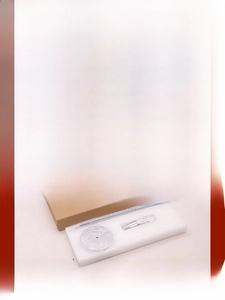 Detailed components of gold iron candlestick with secure foam and cardboard packaging