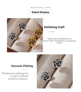 Macro detail of rose flower earrings with multi-layer petals and polished finish