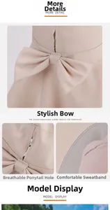 Detail of sun hat showing ponytail hole, sweatband, and large beige bow ornament