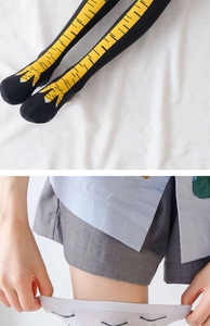 Detail of creative chicken feet knee high socks and simple white cartoon pattern socks