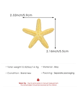 Detail showing dimensions of the gold starfish brooch with alloy texture and size measurement