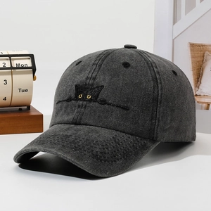 Washed dark grey cotton baseball cap featuring a black cat embroidery and adjustable fit