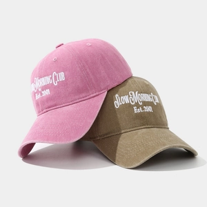 Pink and khaki washed cotton baseball caps with Slow Morning Club embroidery for outdoor sports