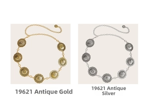 Detailed view of antique gold and silver bohemian waist chains with embossed patterns