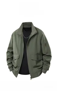 Detail of sage green flight jacket with a sleeve utility pocket and ribbed collar design