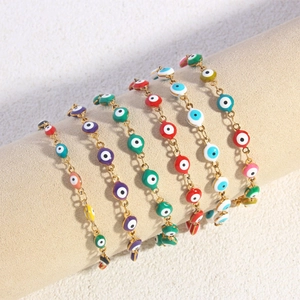 Adjustable stainless steel evil eye bracelets in multiple colors with gold finish
