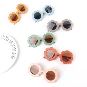Kids flower petal sunglasses in six matte candy colors with UV protection for toddlers