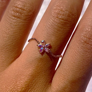 Elegant rose gold flower ring with aurora opal petals and beaded band for women
