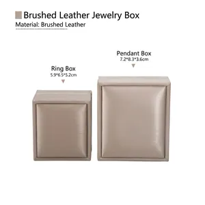Brushed leather jewelry box set for rings and pendants in champagne gold finish