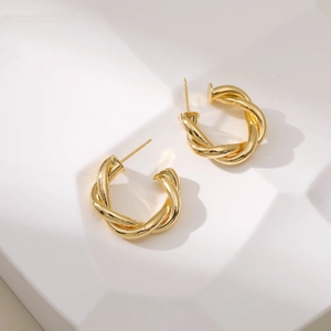 Chic 18K gold plated twisted hoop earrings with irregular minimalist metal texture