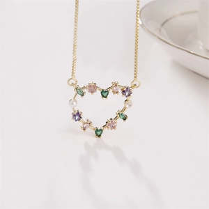 Gold plated necklace with heart pendant featuring colorful zircons and a small pearl