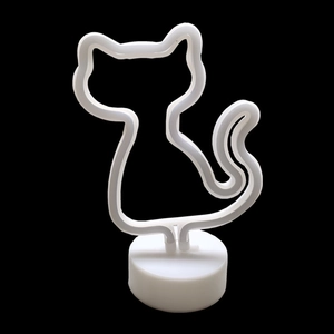 Detailed view of cat-shaped neon desk lamp with steady white circular base on black background