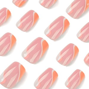 Orange and white press-on nails featuring a minimalist wavy swirl pattern design