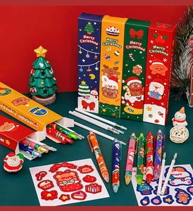 Detailed Christmas stationery set with pens and stickers in a festive gift package