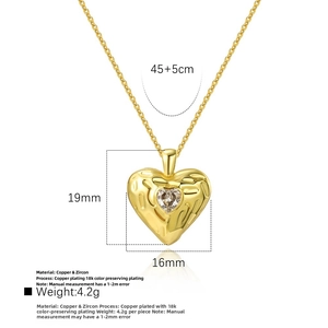 Detail view of 18k gold plated heart pendant with zircon stone and size measurement