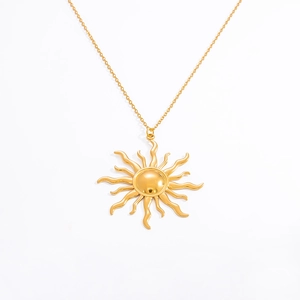 Detail of 18k gold plated stainless steel necklace featuring a sun shaped pendant