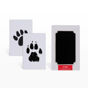 Detail of clean-touch ink pad set with black pet paw prints on white paper cards