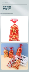 Detail of transparent candy bag with red hearts, Love You text and golden twist tie