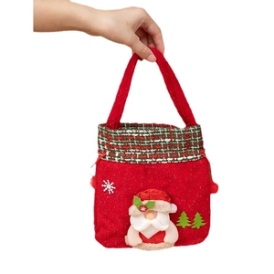 Red felt Christmas gift bag with Santa Claus applique and snowflake decorations