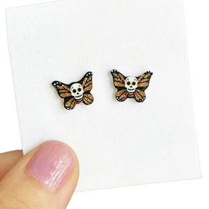 Glitzernde Totenkopf-Schmetterlings-Ohrstecker in Orange und Schwarz für Tag der Toten
