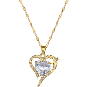 Luxurious gold heart pendant necklace with zircon crystals and full pavé detailing
