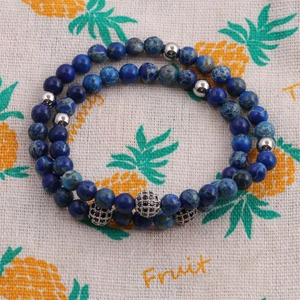 Bracciale di perle in pietra imperiale con sfera di zirconi 6mm e accenti argentati