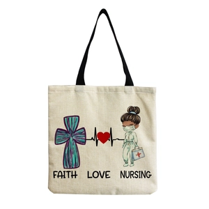 Detailed close-up of nurse canvas tote bag showing Faith Love Nursing print and fabric texture