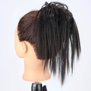 Messy chic black bun claw clip hairpiece on model for a voluminous lazy ponytail look