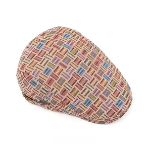 Top view detail of the colorful plaid textured jacquard fabric on a retro flat cap