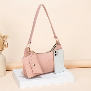 Pink woven leather underarm bag set with crescent purse and adjustable shoulder strap