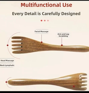 Detail view of sandalwood massage comb showing 5-tooth structure for head and body therapy