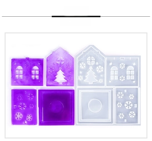 Detail view of DIY Christmas house silicone molds for resin crafts with snowflake patterns