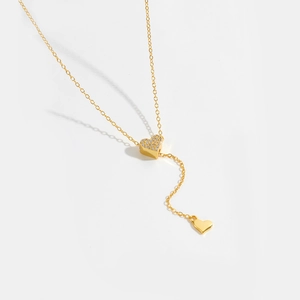 Adjustable S925 sterling silver Y-necklace featuring a gold heart slider with pavé cubic zirconia