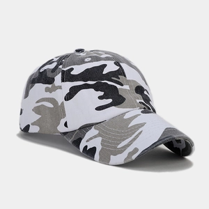 Detail of outdoor camouflage baseball cap with breathable eyelets and curved brim