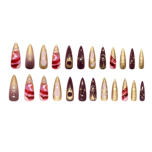 Purple and gold stiletto press-on nails with celestial star and moon patterns, 24 pieces