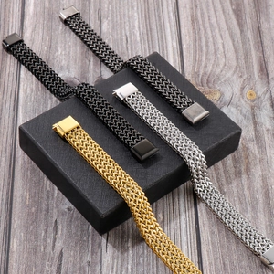 Close-up of triple-layered titanium steel wheat chain bracelets with magnetic clasp
