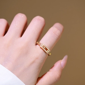 Movable triple-stone sliding ring in gold finish featuring a wide band creative design