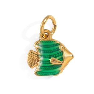 Close-up of golden fish pendant with green enamel stripes on a white background