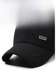 Close-up of black baseball cap featuring metal Sport badge and embroidered brim detail
