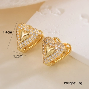 Close-up of gold plated heart earrings with zircon stones and 1.4cm dimensions